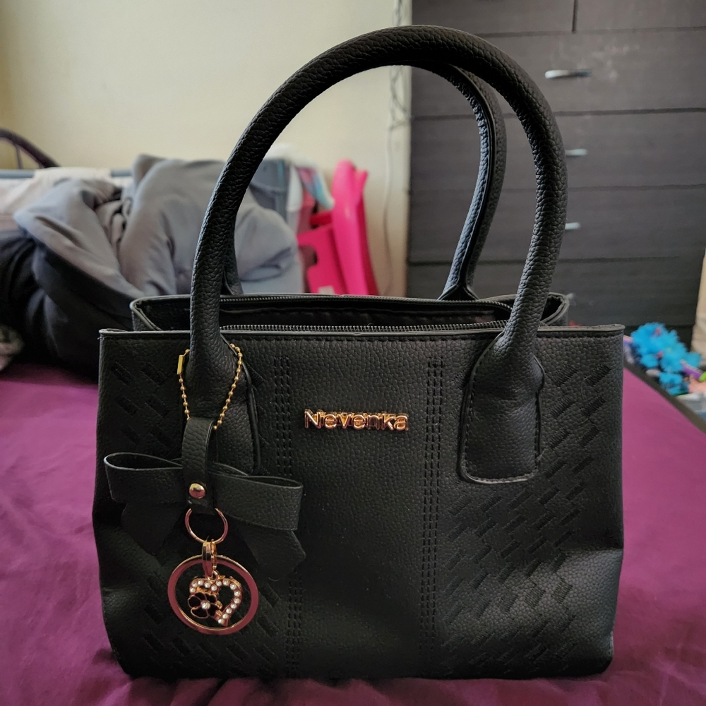 Nevenka Black and Gold Purse